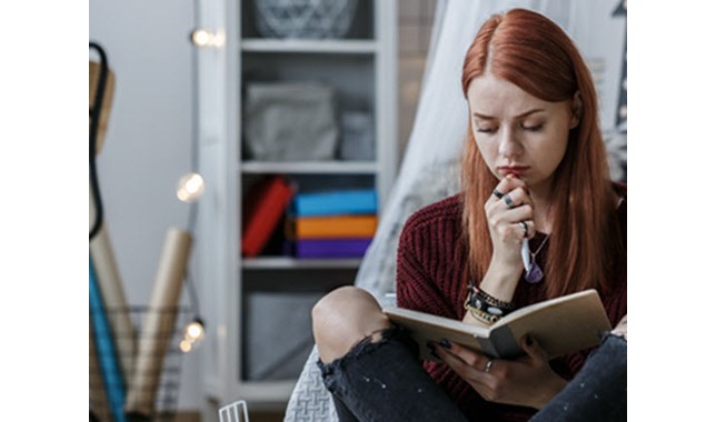 Girl reading diary