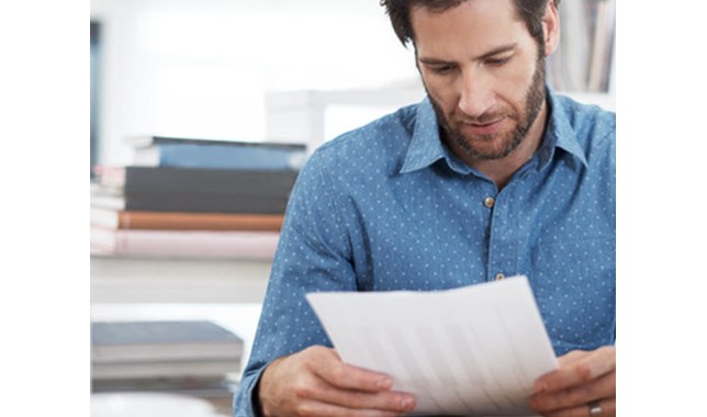 Man looking at the documents